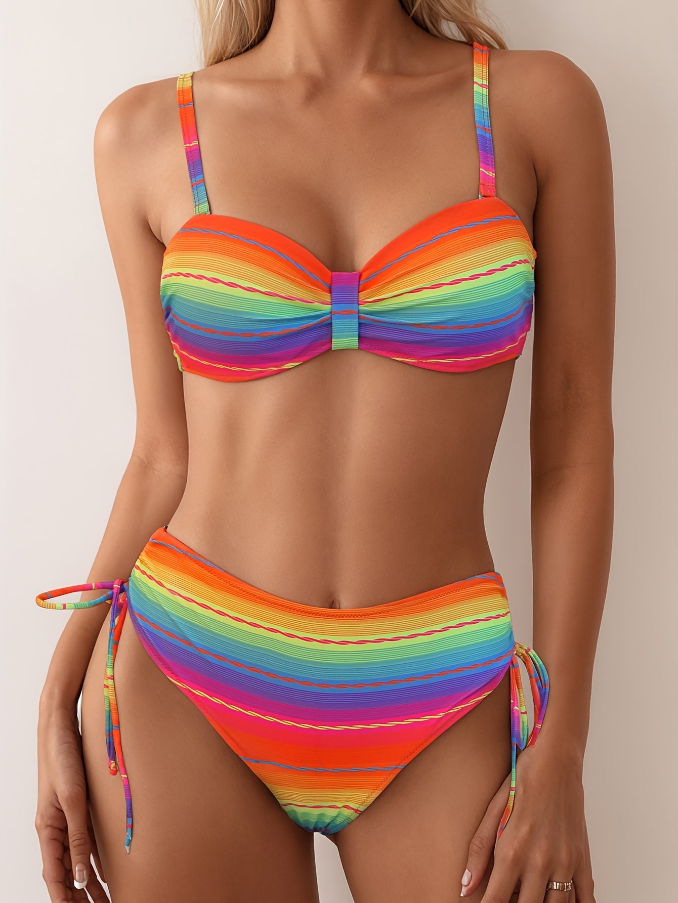 Two-Piece Swimsuit with a Drawstring Design, Featuring a Colorful Striped Hard-Shell Top And Pants.