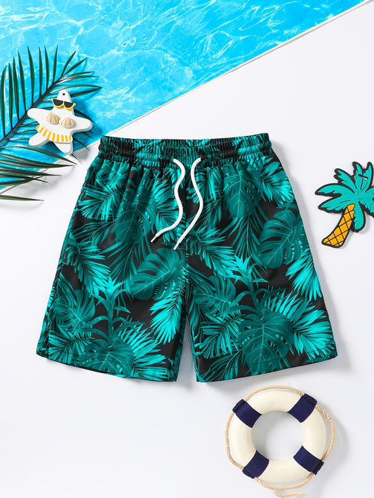 Boys' Tropical Leaf Print Swim Trunks with Adjustable Drawstring - Quick-Dry Polyester Beach Shorts for Summer Fun, Vibrant Blue & Black Design, Poolside Apparel | Tropical Print Shorts | Polyester Blend