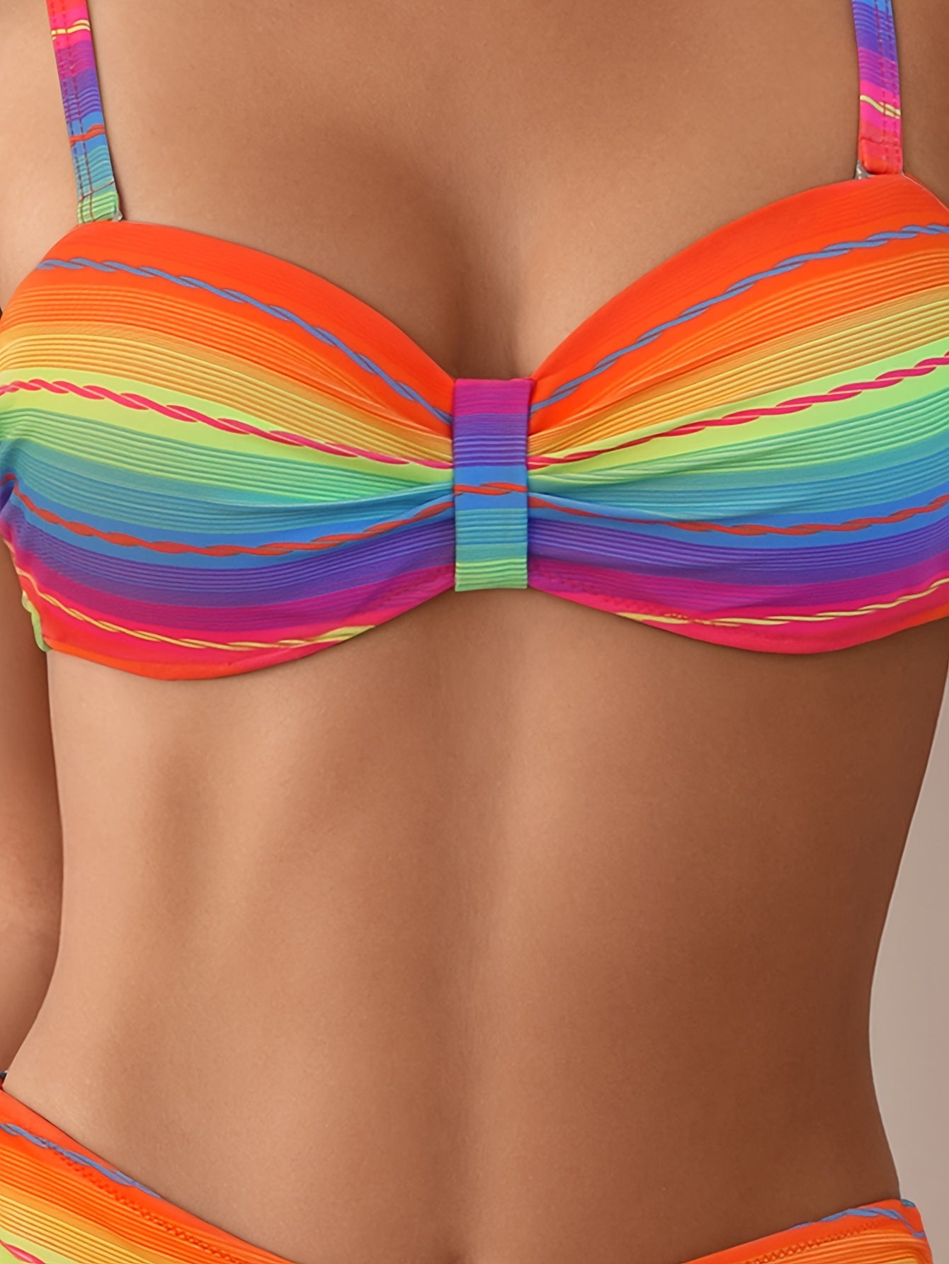 Two-Piece Swimsuit with a Drawstring Design, Featuring a Colorful Striped Hard-Shell Top And Pants.